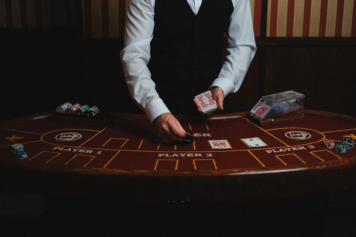Professional dealer dealing cards