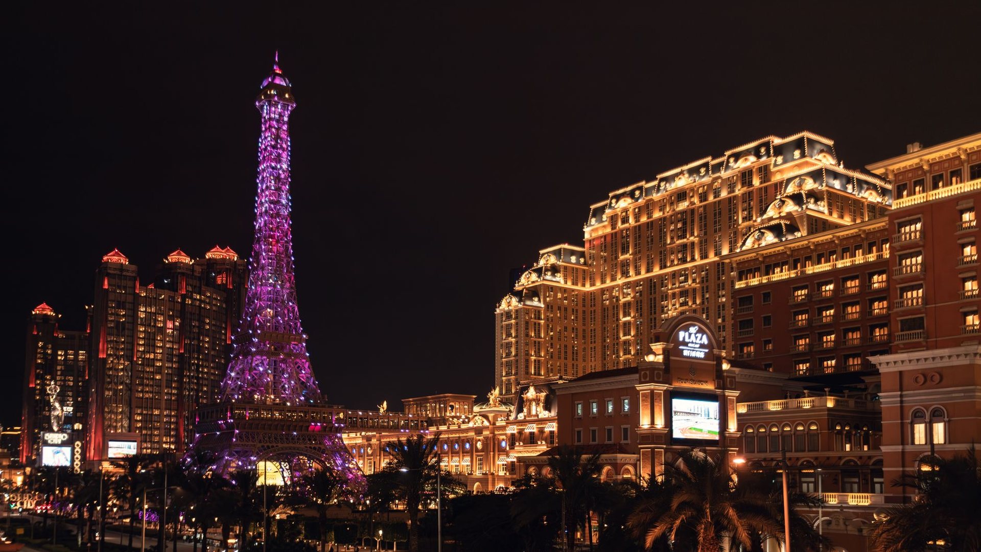 Casino hotel tower lit at dusk